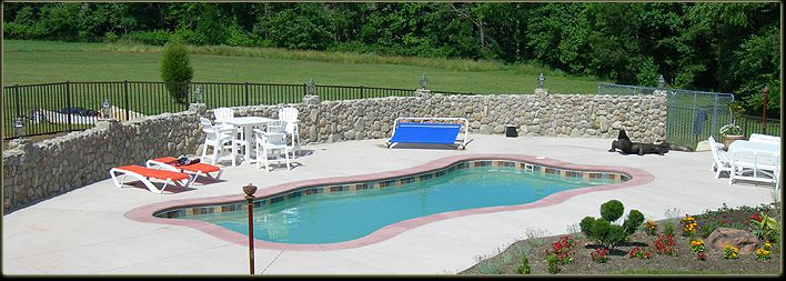 Fiberglass Pool with Stone Wall