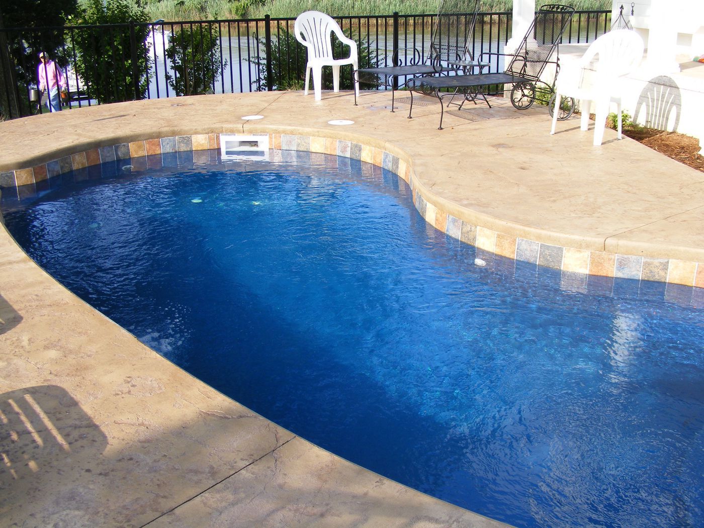 fiberglass pool with cantilevered coping