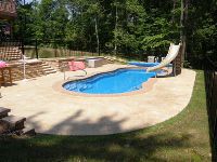 fiberglass pool installed by river pools and spas in fredericksburg with slide