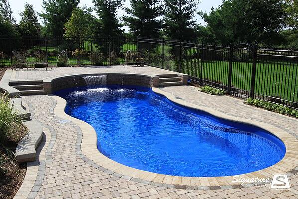 Brick coping around swimming pool 