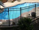 Black Powder Coat Aluminum Fence around a fiberglass pool install by river pools and spas