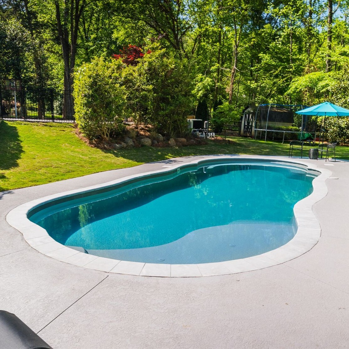008. River Pools C40 in Granite Gray with brushed concrete and natural stone coping-2
