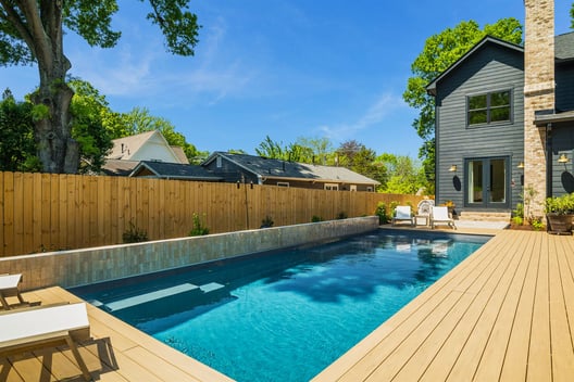008. River Pools M35 in Granite Gray with composite wood patio and coping