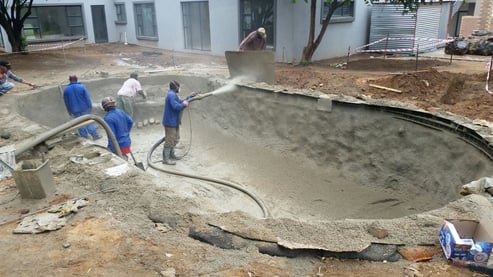 Spraying on a concrete pool