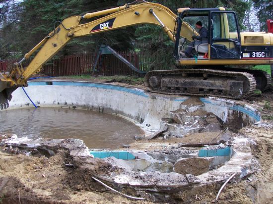 Concrete pool demolition - replacing a concrete pool with a fiberglass pool