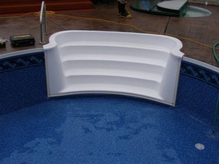 White pool steps on vinyl liner pool