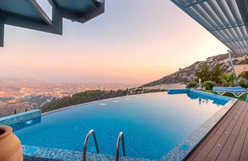 Hillside infinity pool with tile