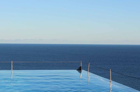 infinity pool by the ocean