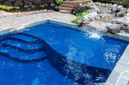 fiberglass pool with tanning ledge