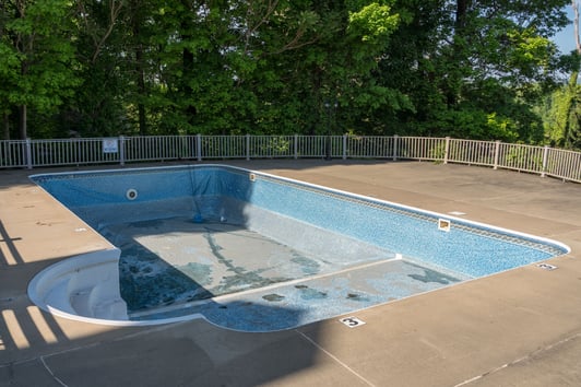 Drained inground vinyl liner swimming pool