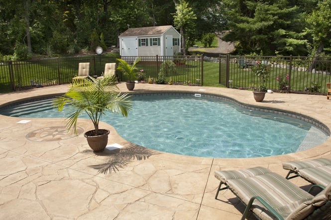 freeform vinyl liner inground pool with patio