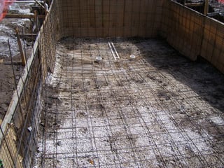 Steel rebar for a concrete pool