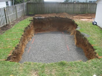 Excavated pool area with stone base