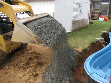 Construction of inground swimming pool - is backfill sand or backfill stone better?