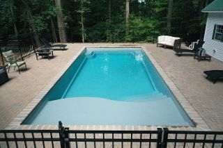 Grey fiberglass swimming pool 