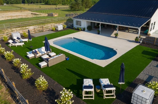 L36 pool model by River Pools in a landscaped backyard.