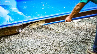 crushed-stone-backfill-around-fiberglass-pool