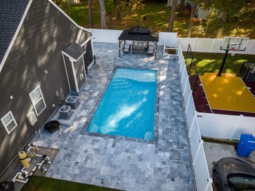 d-series-pool-gray-pavers-small-backyard
