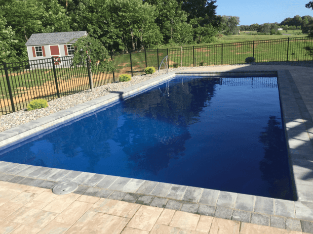 blue fiberglass inground swimming pool