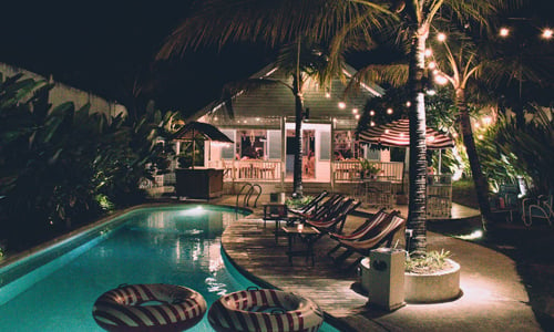 String lights used in pool landscaping