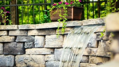 cascade from retaining wall (from below, to show the hidden slot)