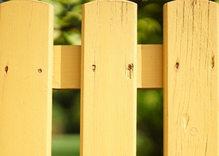 Painted wood pool fence 