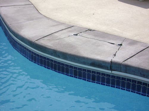 Cracked concrete pool coping