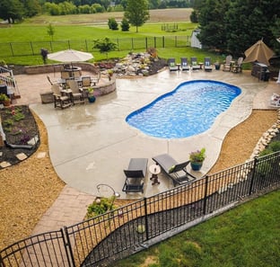 C35 Series pool in California color in a beautifully decorated backyard