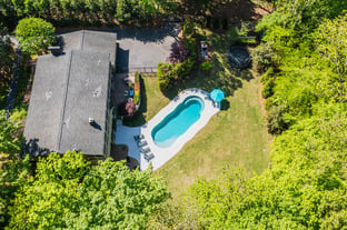 River Pools C40 in Diamond with brushed concrete and natural stone coping