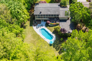 River Pools C40 in Diamond with brushed concrete and natural stone coping