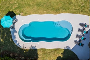 River Pools C40 in Diamond with brushed concrete and natural stone coping