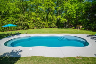 River Pools C40 in Diamond with brushed concrete and natural stone coping