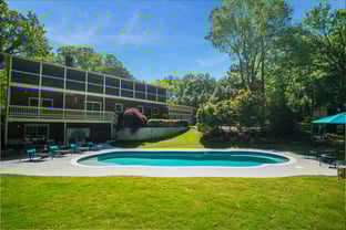 River Pools C40 in Diamond with brushed concrete and natural stone coping