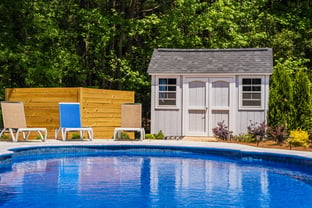 River Pools C40 in Maya Shimmer with brushed concrete and natural stone coping