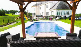 C40 pool with shade structure and rain fall water feature