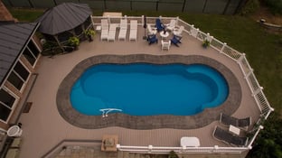 C40 with 3 stamped concrete border and trex composite decking.