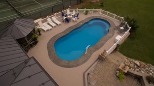 C40 with 3 stamped concrete border and trex composite decking.