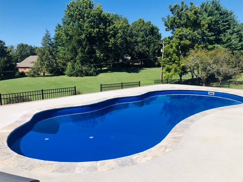 020. I Series in Maya with natural stone coping and brushed concrete deck