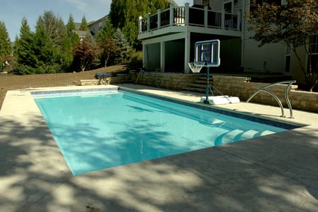 006. R36 pool in Arctic with textured concrete deck and waterline tile