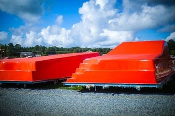 red-orange fiberglass pool molds
