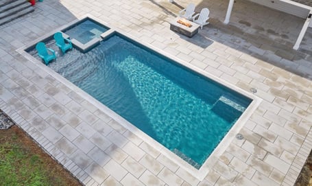 river-pools-x36-gray-patio-with-firepit