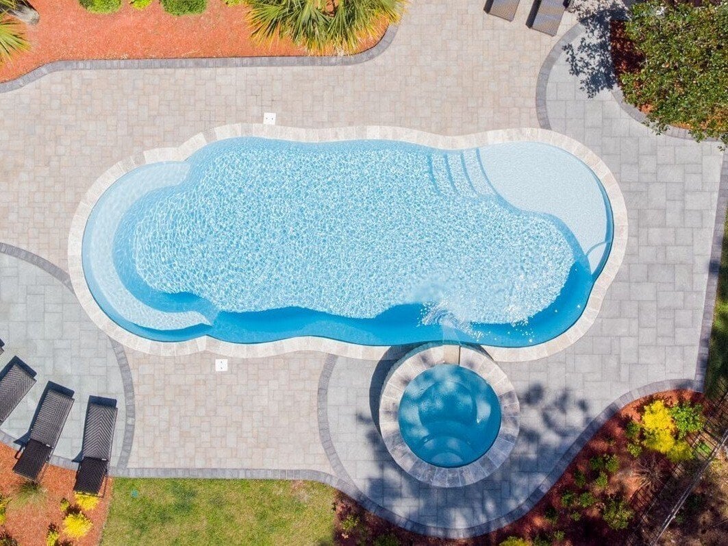 011. River Pools C40 + RS08 with spillway in Caribbean Sparkle with concrete paver patio and natural stone coping-1-1 011. River Pools C40 + RS08 with spillway in Caribbean Sparkle with concrete paver patio and natural stone coping-1-1