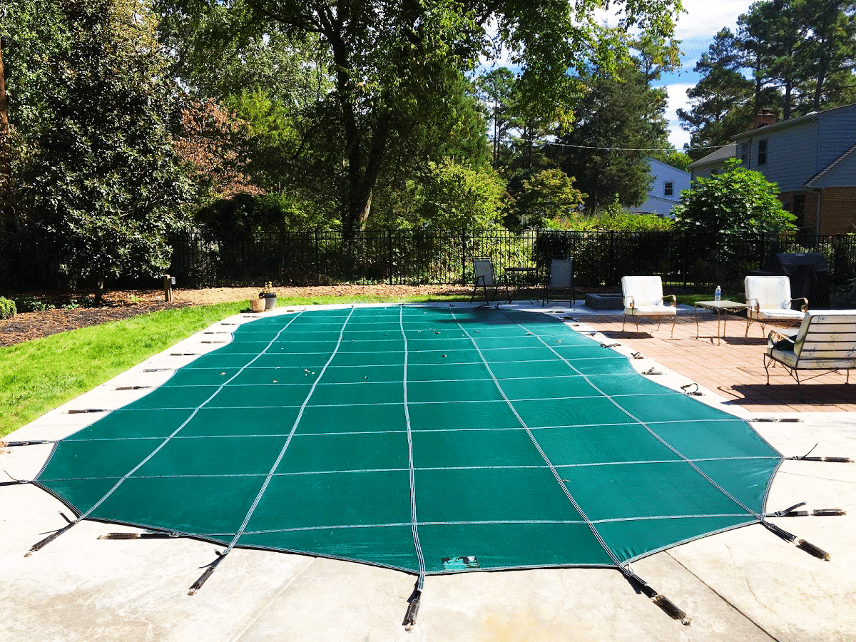 Attention Fiberglass Pool Owners: Keep Your Solid Winter Cover Drained!