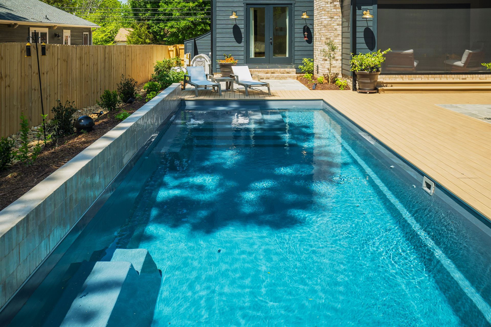 River Pools M35 in Diamond with composite wood patio and coping