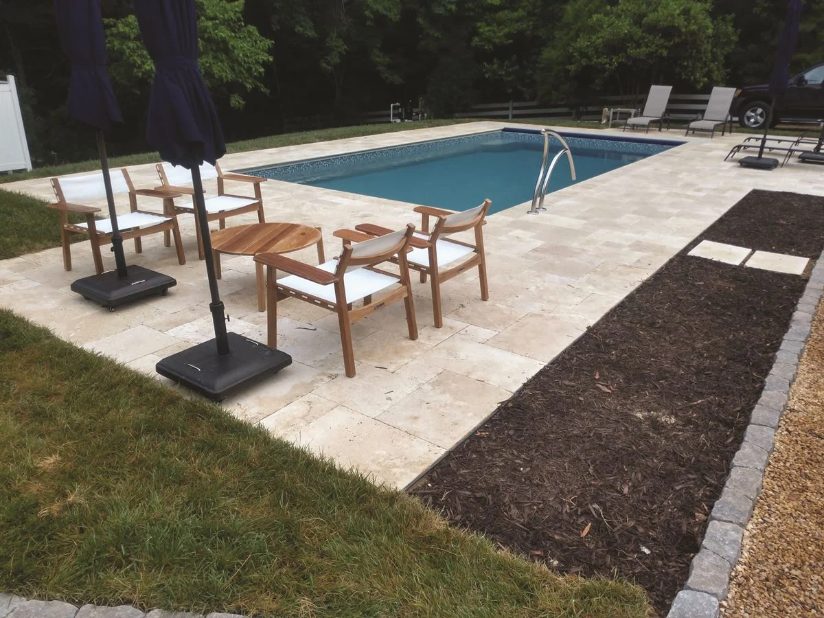 R28 pool in Diamond with travertine decking