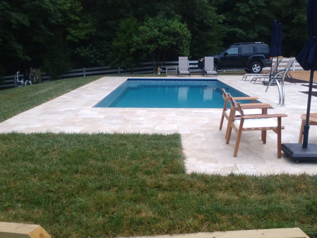 R28 pool in Diamond with travertine decking