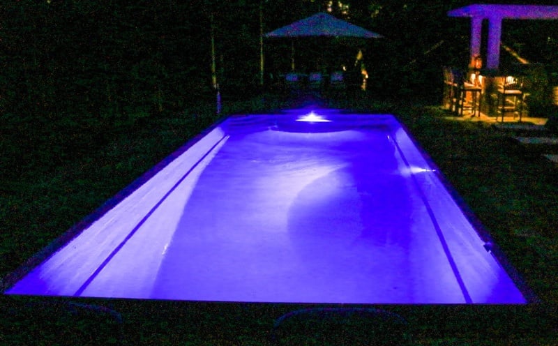 T40 in granite grey color at nighttime with purple pool lights on