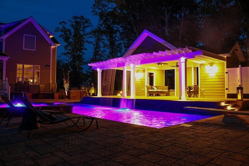 T40 pool in maya blue lit up at night