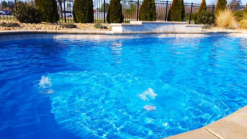 How to Install a Fiberglass Pool with a Tanning Ledge—the Right Way